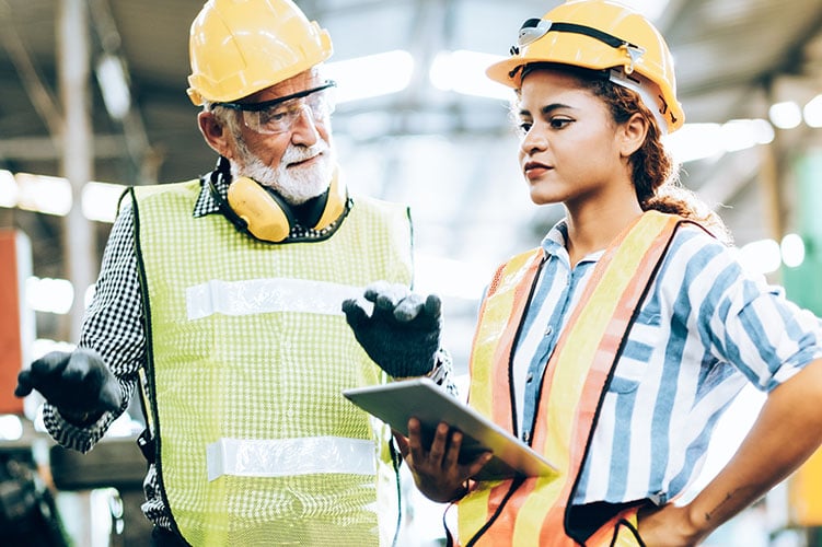 Two Construction Workers Talking 